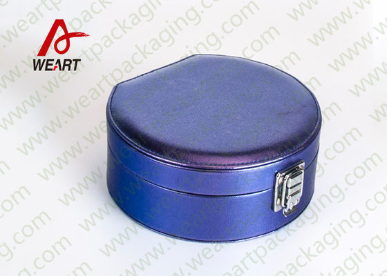 Caja de regalo cosmética azul redonda con botón de metal, embalaje cosmético de cartón dentro de material de terciopelo negro